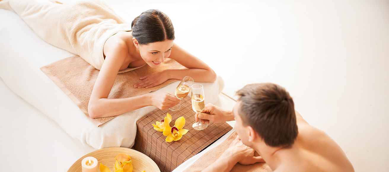 picture of couple in spa salon drinking champagne